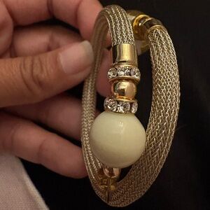 Elegant Gold and Cream Bracelet